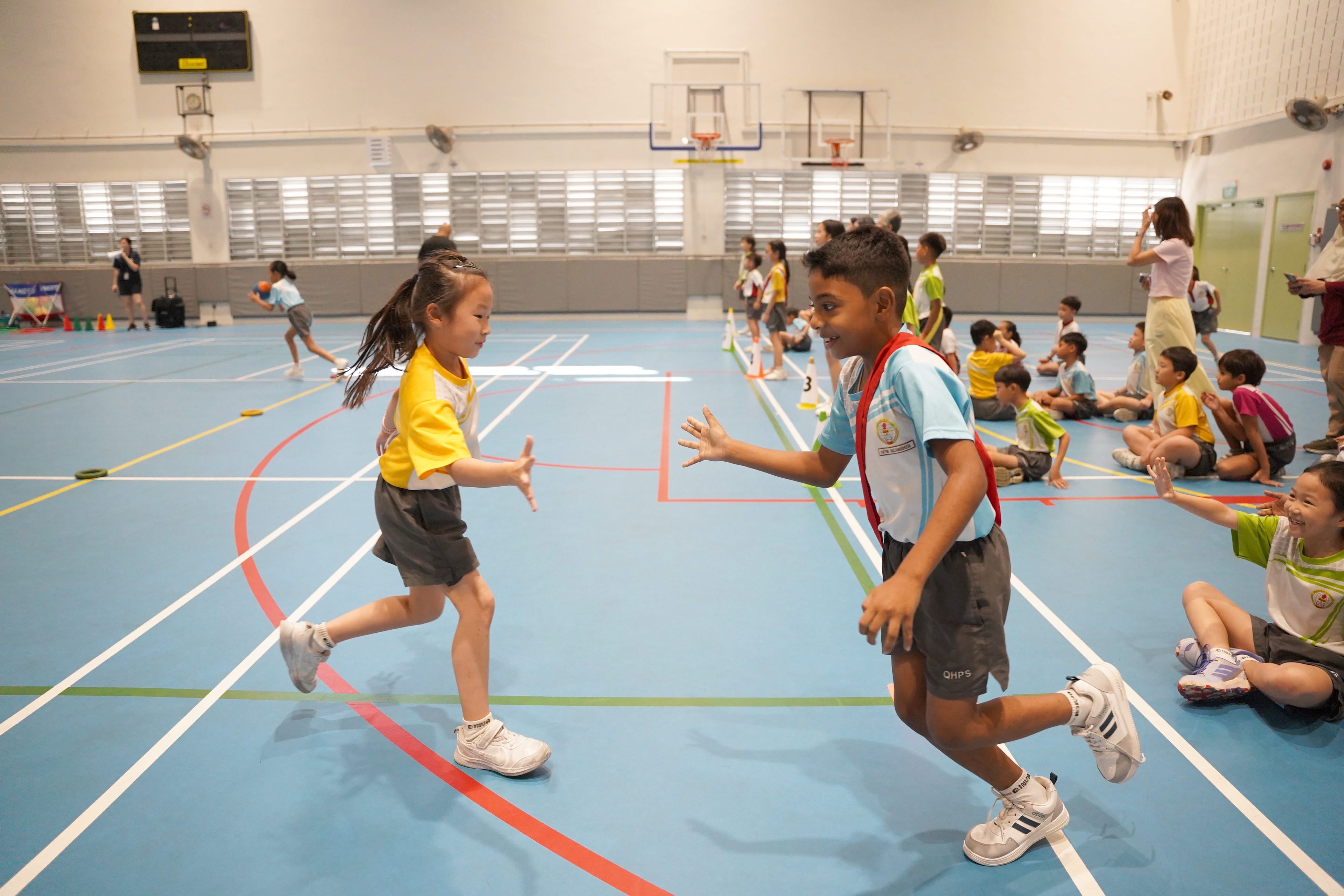 Students participating in relay race